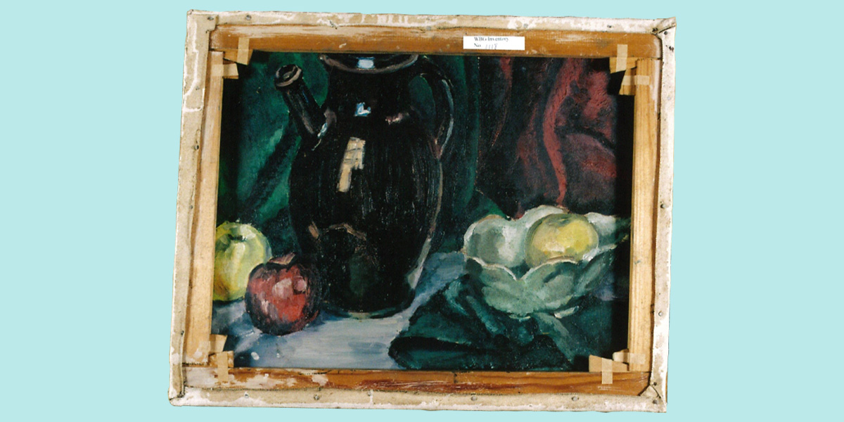 the reserve side of an canvas with an oil painting of a still life with a black jug and apples