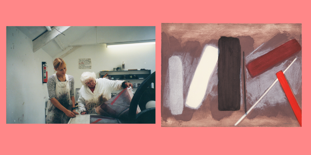 A colour photo of two women pulling an etching from an etching plate and a colour abstract etching of blocks of colour on a pale mauve background